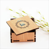 Square trinket box with fern design, crafted from NZ veneer and featuring paua inlay, ideal for jewelry and keepsakes.