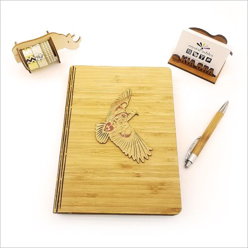 Eco-friendly Bamboo Journal with KWW Kea design, featuring 120 pages of premium cartridge paper for versatile journaling.