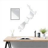 Kiwiana Wall Art featuring a large NZ map with a black and white Koru pattern, perfect for home and office decor.