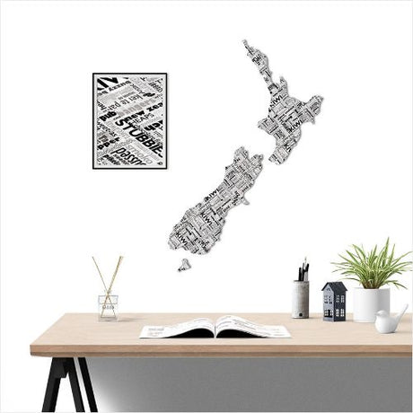 Kiwiana Wall Art featuring a large New Zealand map in a newspaper pattern, crafted from durable Aluminium Composite Material.