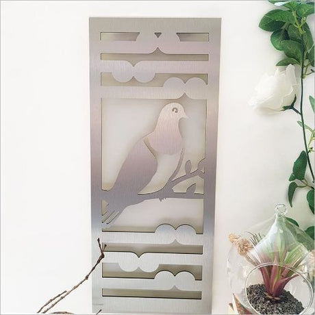 Kiwiana Wall Art featuring a Kereru and Koru design in Silver, crafted from lightweight and rust-resistant ACM, ideal for any decor.