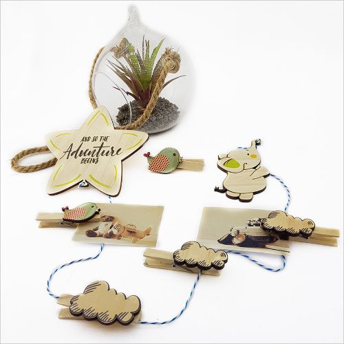 Whimsical art display featuring an elephant and star, perfect for showcasing kids' artwork in vibrant eco-friendly decor.