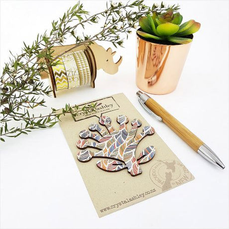 Elegant mini wall art featuring a feather pattern inspired by New Zealand's Pohutukawa tree, perfect for modern decor.