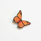 Kiwiana Wall Art in printed pine, featuring a vibrant Monarch design, ideal for decor or gifts, measures 95mm x 66mm.