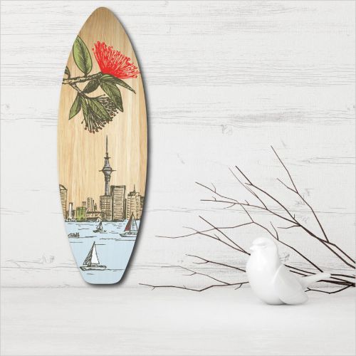 Kiwiana Wall Art featuring a pine ply surfboard design, showcasing Auckland's coastline and vibrant New Zealand culture.