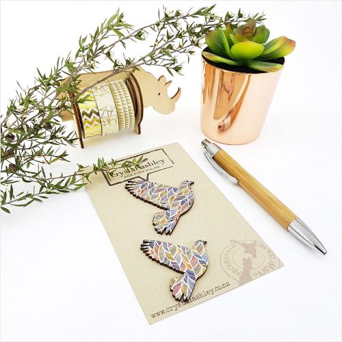 Intricate pigeon feather-patterned wall art mini shapes in MDF, perfect for unique home decor and nature-inspired aesthetics.