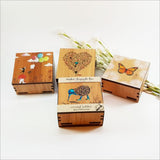 Charming square wooden trinket box with fern design and NZ paua inlay, ideal for jewelry and keepsakes.