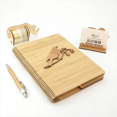 Bamboo Journal featuring Tui on Kowhai design, eco-friendly, 120 pages of premium paper, perfect for writing and sketching.