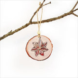 KWW Flower Wood Slice Ornament features intricate laser-cut designs and vibrant prints, perfect for unique holiday decor.