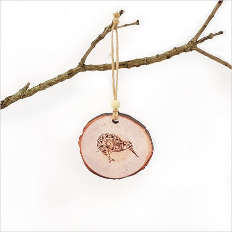 Wood slice ornament featuring a kiwi design, perfect for rustic Christmas decor, measuring 80mm x 75mm and double-sided printed.