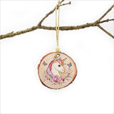Wood slice ornament featuring a whimsical unicorn design, perfect for Christmas decor or thoughtful gifting.