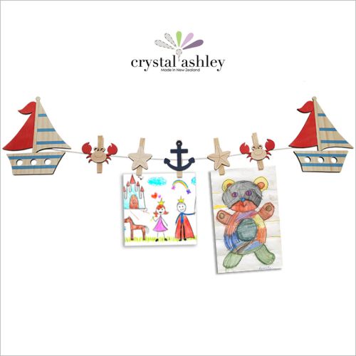 Stylish Boat Art Pegs made from eco-friendly pine veneer for hanging art and photos, featuring a vibrant, durable design.
