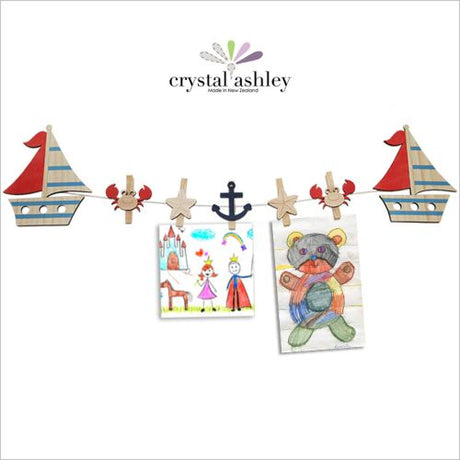 Stylish Boat Art Pegs made from eco-friendly pine veneer for hanging art and photos, featuring a vibrant, durable design.