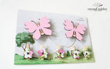 Colorful Butterfly Art Pegs featuring pink butterflies and patterned flower pegs, perfect for displaying kids' artwork.