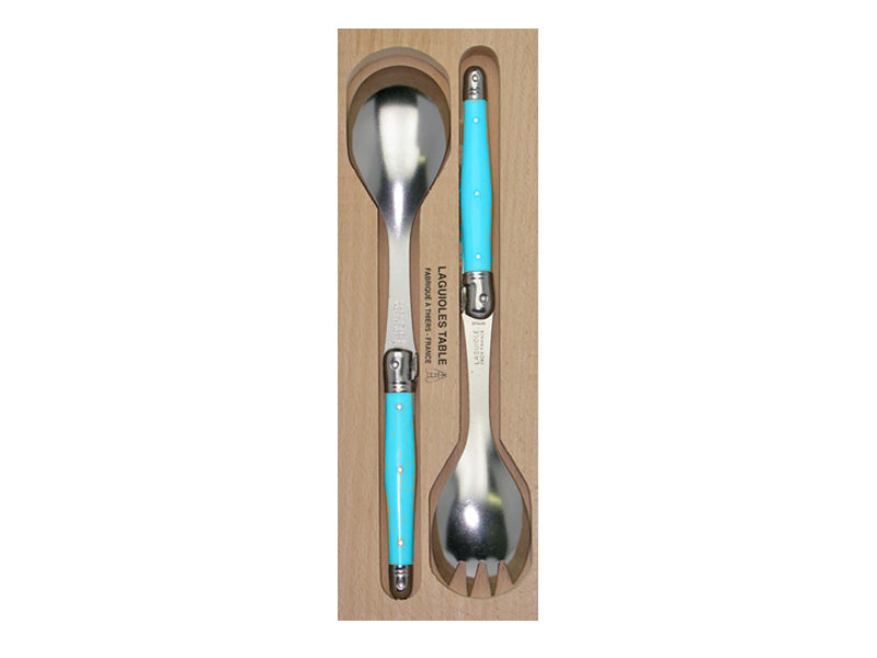 Handcrafted blue resin salad server set, featuring stainless steel tines and signature Laguiole bee, perfect for elegant dining.