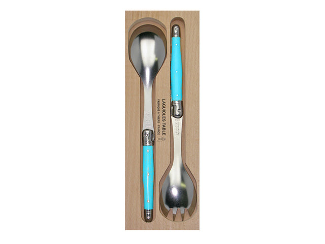 Handcrafted blue resin salad server set, featuring stainless steel tines and signature Laguiole bee, perfect for elegant dining.