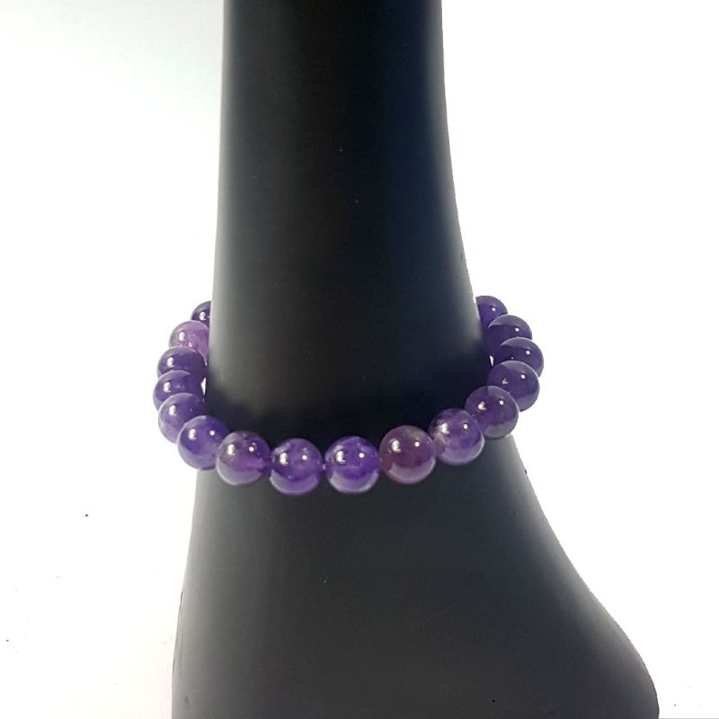 Set of 3 Amethyst 8mm bead bracelets showcasing purple hues, perfect for stacking or solo wear.