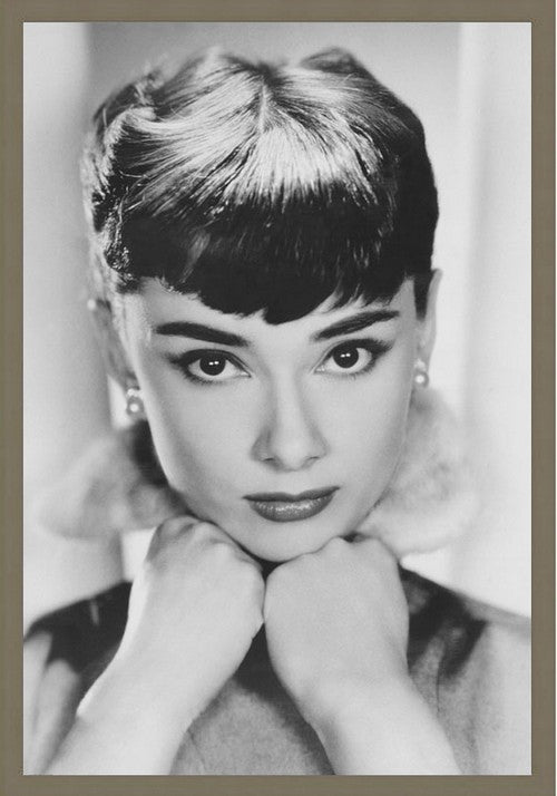 Framed art of Audrey Hepburn, 60x90cm, with glass front and easy hanging string, perfect for any decor.