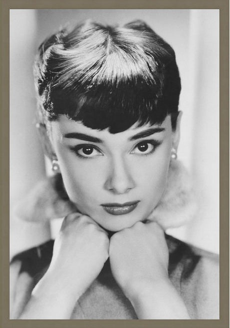 Framed art of Audrey Hepburn, 60x90cm, with glass front and easy hanging string, perfect for any decor.