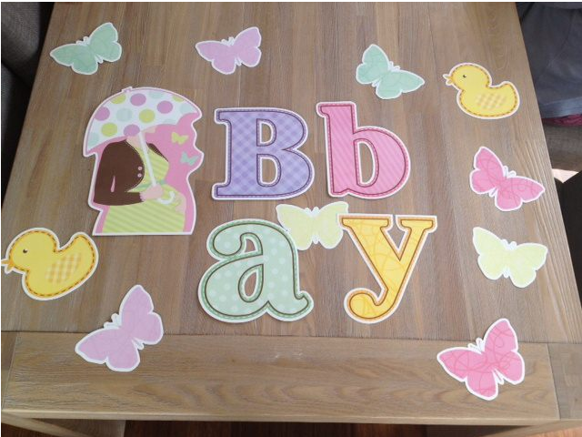 Whimsical Baby Shower Cut Outs in various sizes, perfect for festive decorations and creative arrangements.