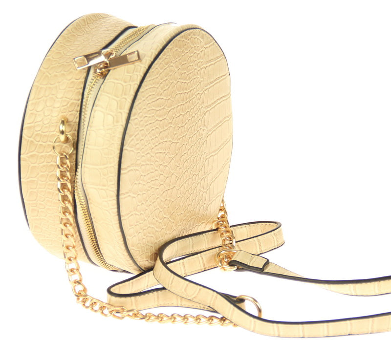 Cream handbag in a round box design, made from durable imitation leather, perfect for stylish everyday use.