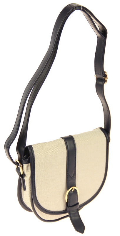 Chic navy half-round handbag with buckle detail, perfect for day-to-night transitions and stylish on-the-go functionality.