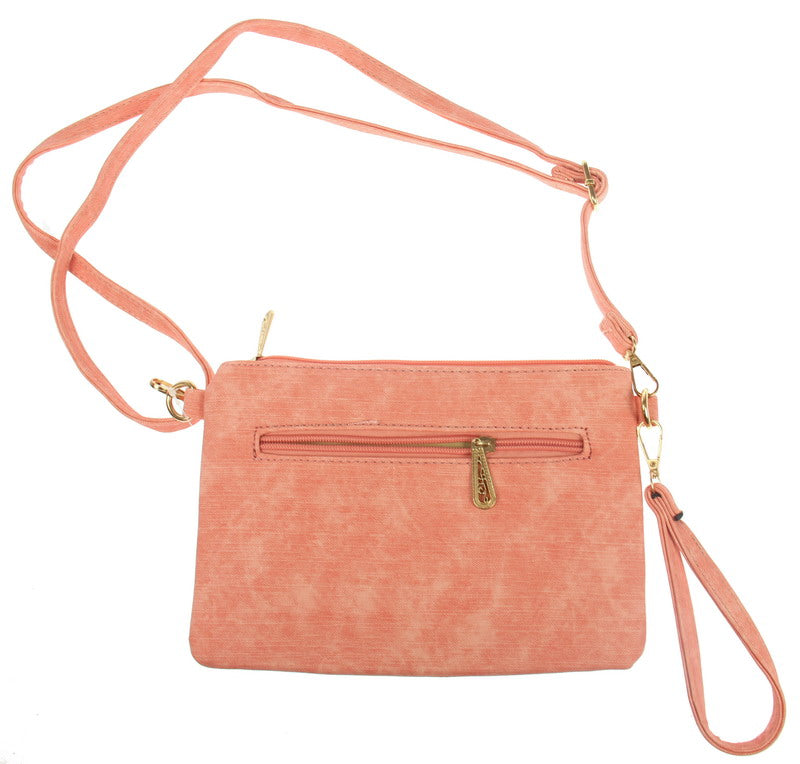 Coral crossbody handbag with back zip pocket, light gold hardware, and dual strap options for versatile wear.