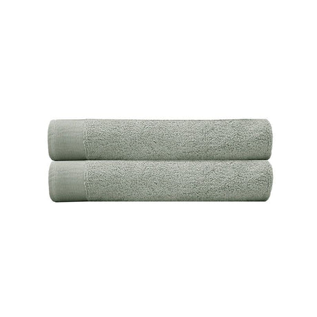 Elvire Bath Towel 2 Pack in Sage, featuring ultra-soft cotton, ribbed border, and 600gsm for exceptional absorbency and comfort.