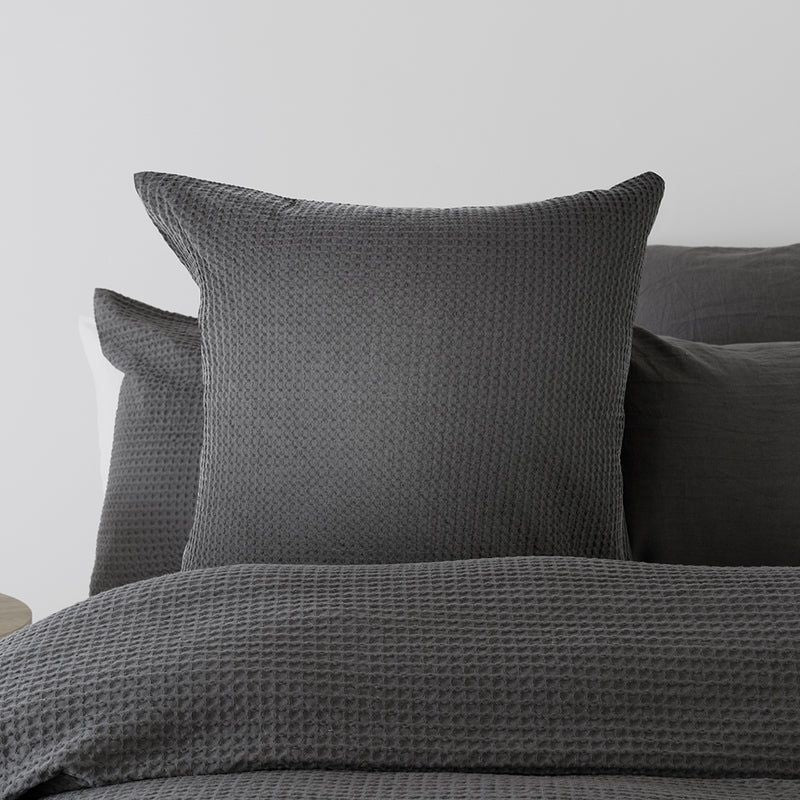 Melville European Pillowcase in soft cotton waffle fabric, 65x65 cm, features a chic charcoal reverse for a sophisticated touch.