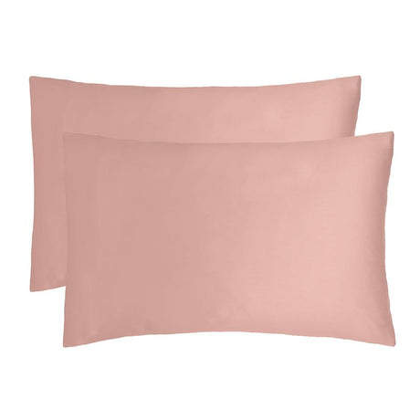 Rose pink bamboo satin pillowcases offering luxurious softness, hypoallergenic benefits, and moisture-wicking for a comfortable sleep.