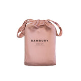 Rose pink bamboo satin pillowcases offering silky softness, reduced hair breakage, and hypoallergenic comfort for a restful night's sleep.