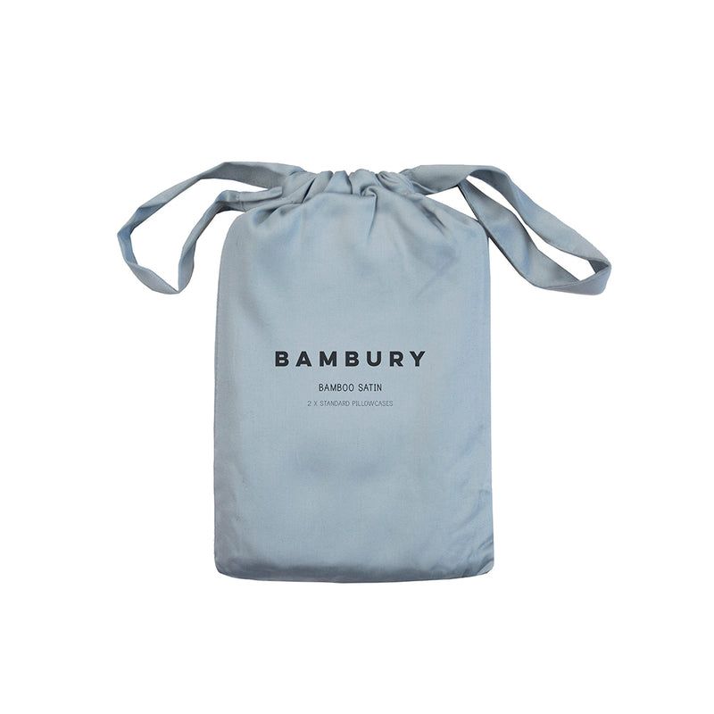 Bamboo satin pillowcases in slate blue, offering a silky-soft touch, hypoallergenic, and moisture-wicking for a luxurious sleep.