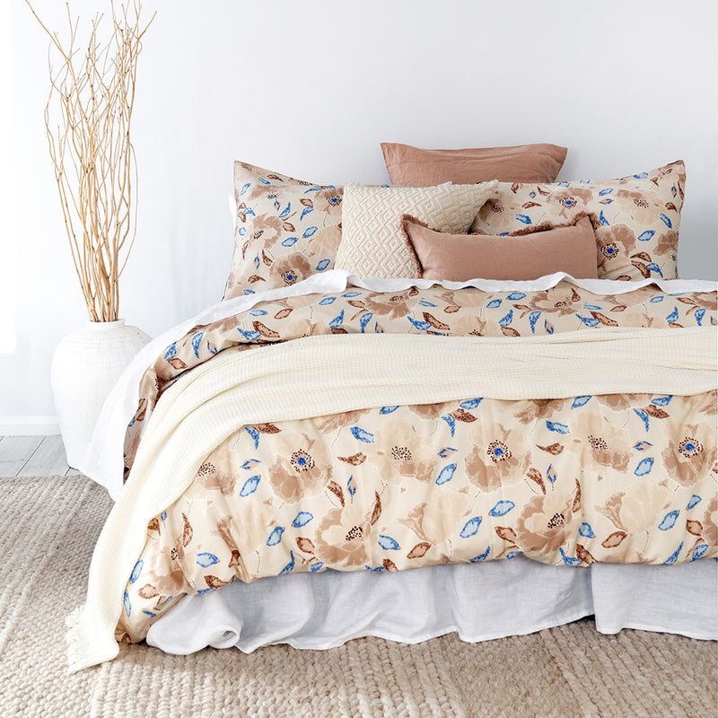 Queen duvet cover featuring gorgeous floral poppy design in chestnut and latte tones, reversible for versatile styling.