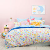 King duvet cover set featuring vibrant squiggle print on 100% cotton sateen, reversible to elegant blue and white pattern.