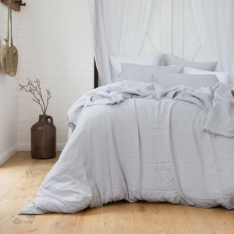 Queen duvet cover set in silver, crafted from 100% French linen, offering elegant comfort and breathability for better sleep.