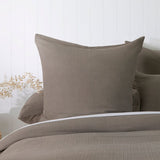 Elegant mid-grey Euro pillowcase crafted from jacquard fabric, featuring a stitched design and matching cotton percale back.