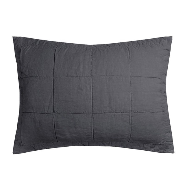 Charcoal linen quilted pillow sham with a textured square pattern, crafted from 100% French Flax for softness and breathability.