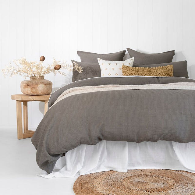 Luxury Queen Duvet Cover in warm mid-grey, featuring textured jacquard fabric with a stitched design for elegant bedroom decor.