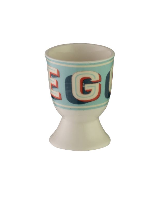 Vintage-style egg cup featuring playful bunny designs, crafted from durable stoneware for fun family breakfasts.