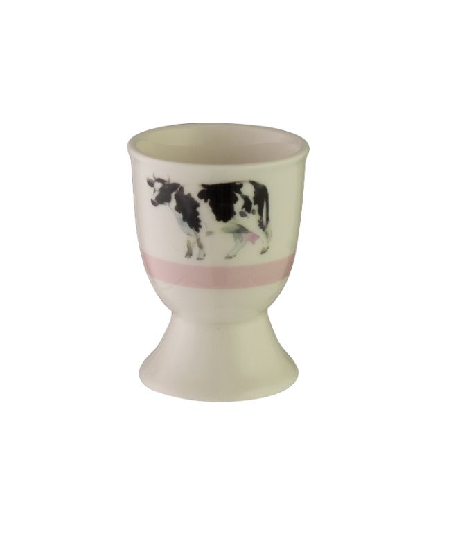 Charming cow-designed egg cup in durable stoneware, perfect for serving boiled eggs and adding fun to breakfast.