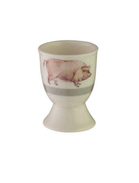 Whimsical Avanti Pig Egg Cup, crafted from durable stoneware, perfect for serving boiled eggs in a fun, stable design.