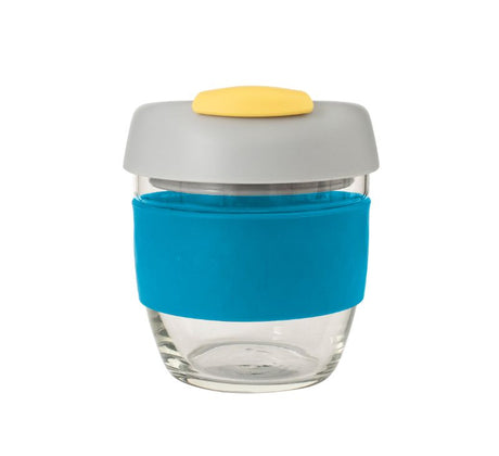 Avanti Glass GoCup Travel Mug in blue, grey, and yellow, featuring a silicone grip and spill-proof design for on-the-go use.