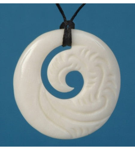 Etched Koru Pendant showcasing unique M?ori craftsmanship, symbolizing new beginnings and sustainable growth.