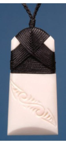 Small bone toki pendant on adjustable cord, celebrating M?ori strength and courage with unique carvings reflecting Kiwiana.
