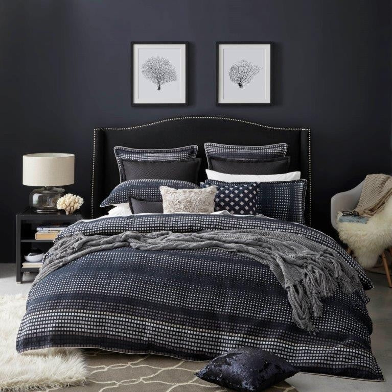 Queen Duvet Set in navy with pixelated pattern, includes duvet cover and pillowcases, finished with ivory piping.