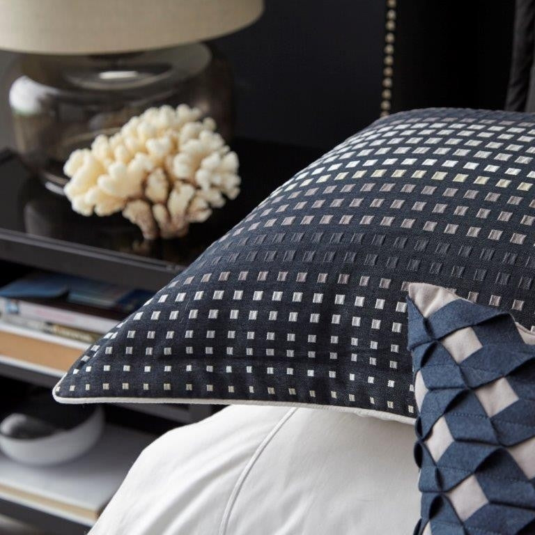 Queen Duvet Set in navy with pixelated pattern, ivory piping, includes duvet cover and two pillowcases for stylish comfort.