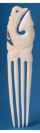Large bone hook with Paua shell inlays, showcasing New Zealand's Kiwiana culture and unique craftsmanship.