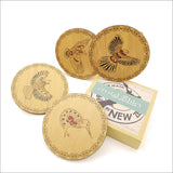 Kowhaiwhai Birds Coaster Set featuring four unique bird designs on 4mm thick Rimu Veneer, ideal for decor and gifts.