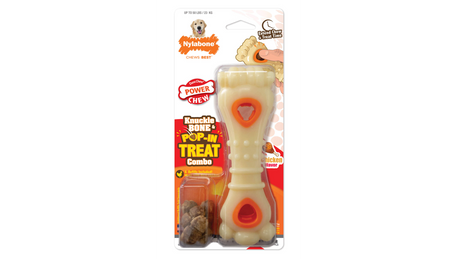 Durable large nylon chew toy shaped like a knuckle bone, infused with chicken flavor, promoting dental hygiene for aggressive chewers.