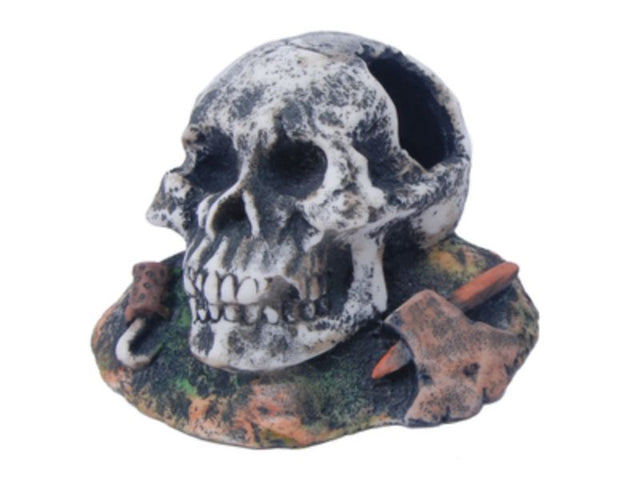 Aquarium skull ornament with hollow openings, 9cm tall, 15cm wide, providing hiding spots for fish and enhancing tank decor.